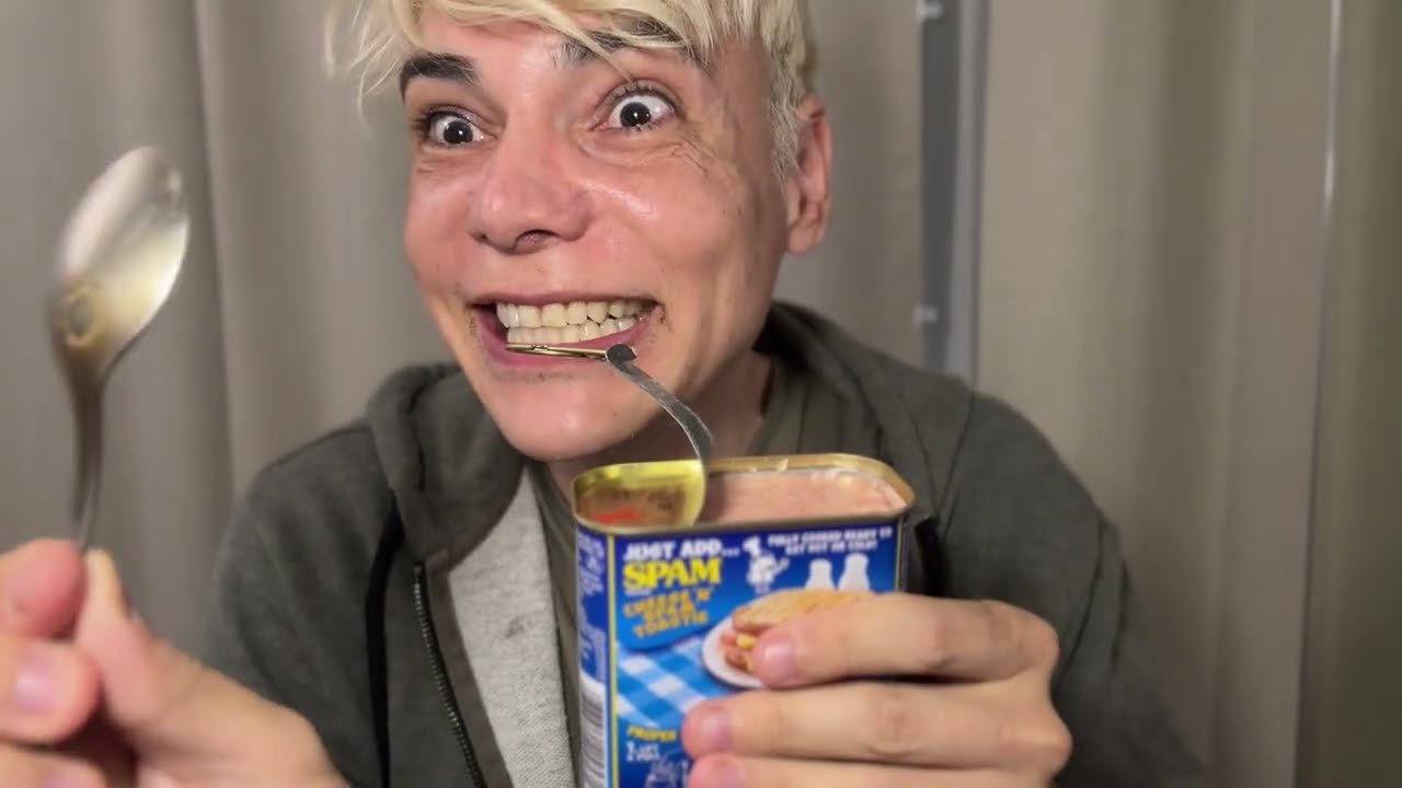 Original frame: Nick holding an open can of SPAM